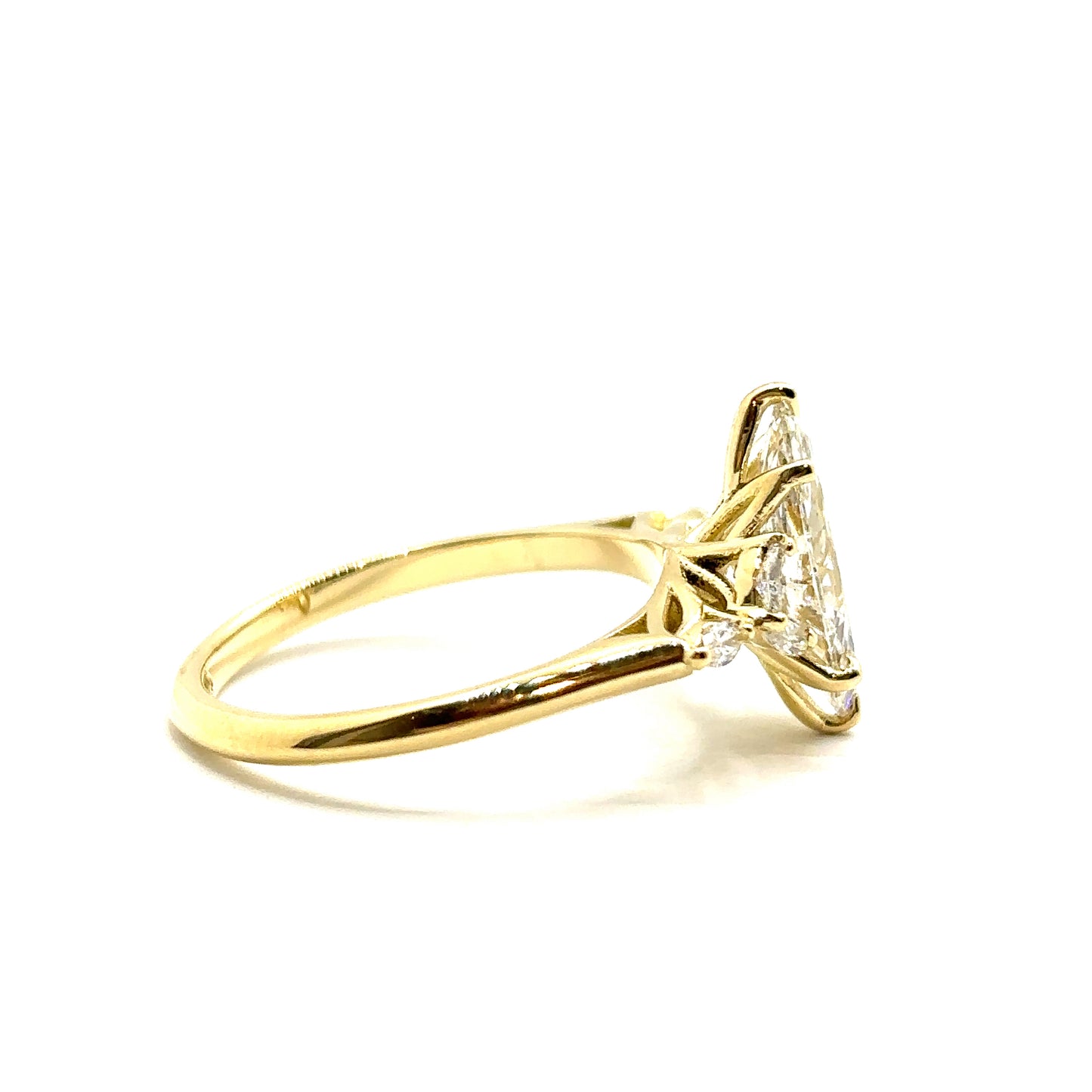 Bespoke Marquise Cut Diamond Engagement Ring 18ct Yellow Gold with 6 marquise side stones and a peridot set in the shank