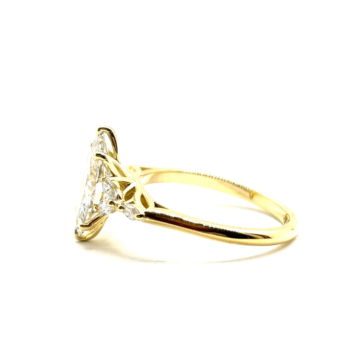 Bespoke Marquise Cut Diamond Engagement Ring 18ct Yellow Gold with 6 marquise side stones and a peridot set in the shank