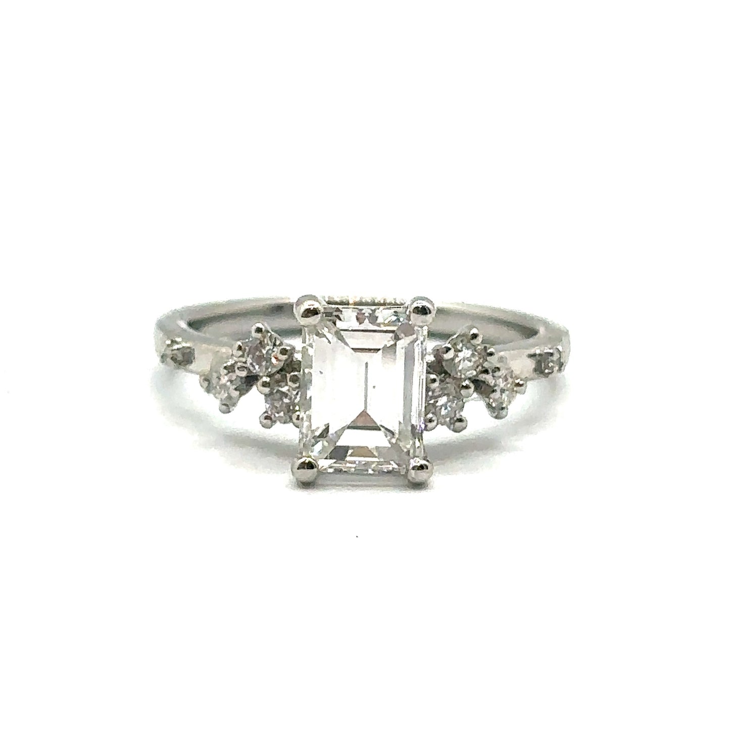 Emerald Cut 'Flowing Nature 'Diamond Engagement Ring with Round Brilliant Side Stones in Platinum
