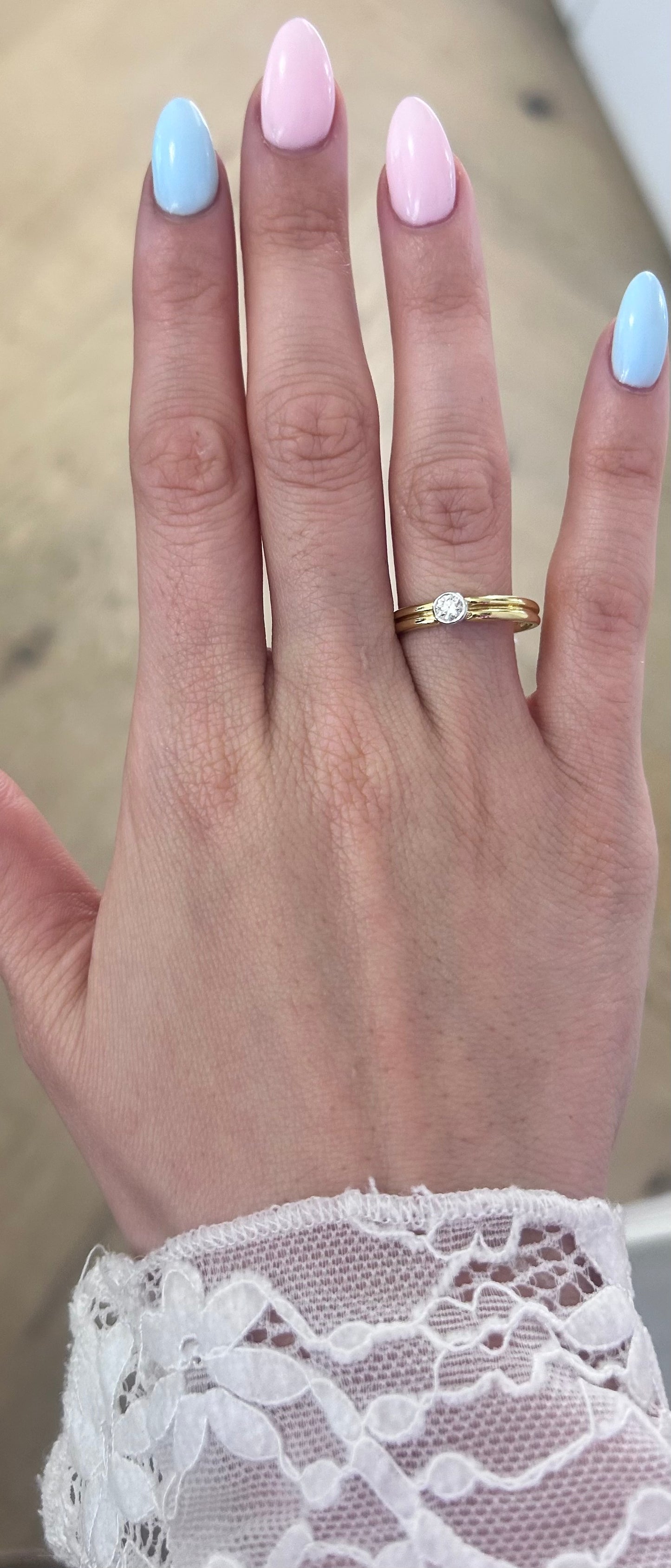 Round Brilliant Cut Diamond Rubover Bezel Set Gold Ring