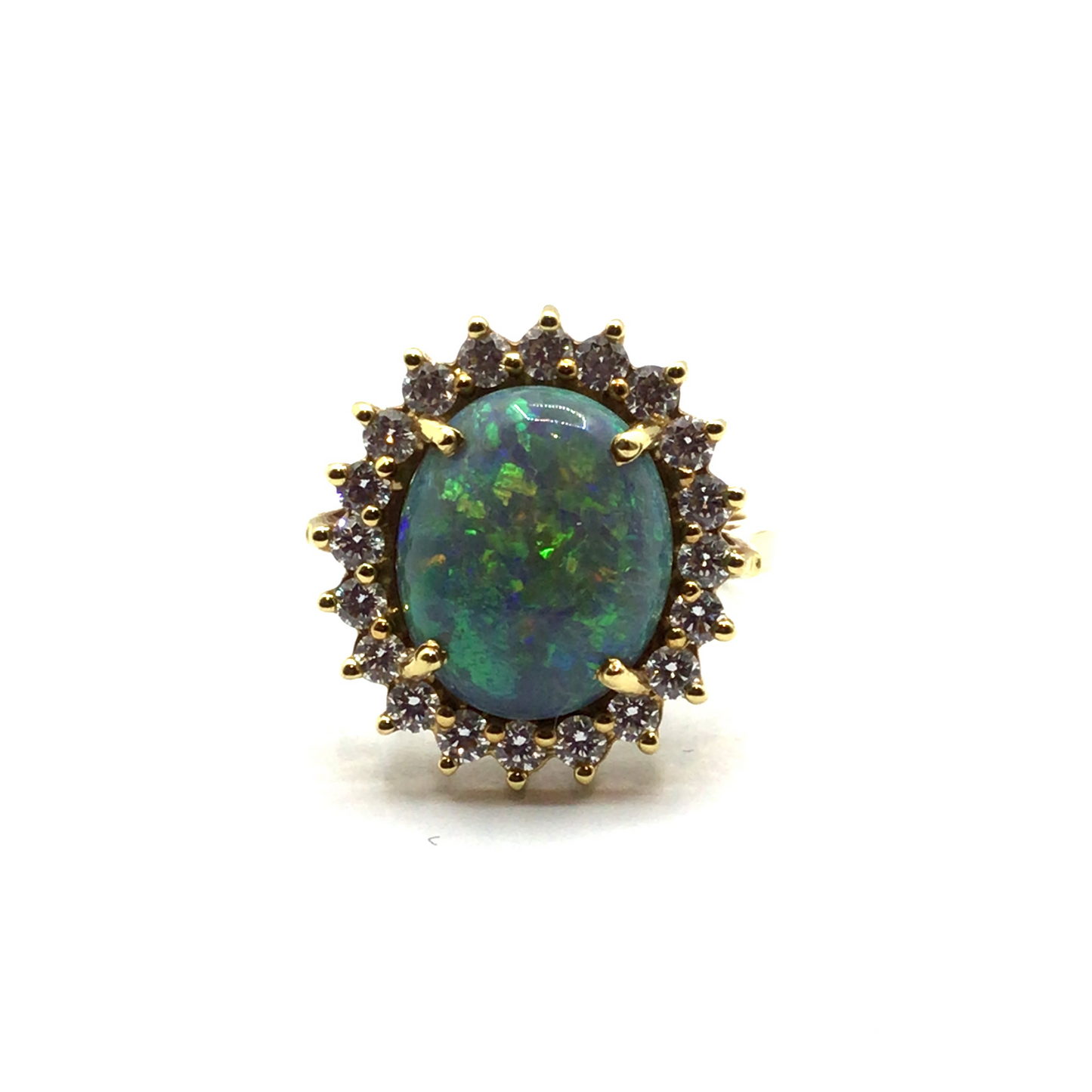 Opal and diamond halo 18ct yellow gold ring
