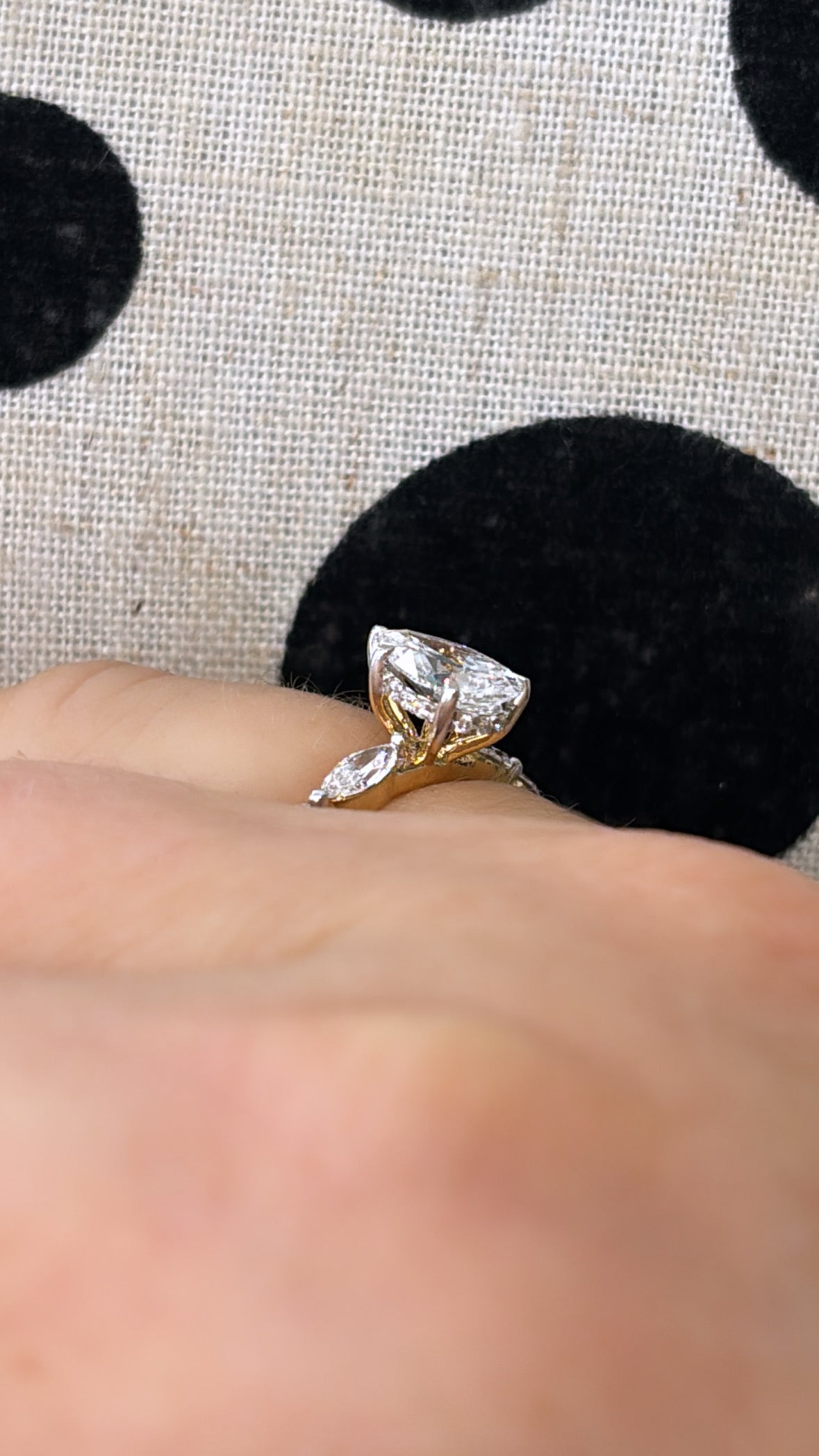 Pear Cut Diamond with Hidden Halo and a Marquise and Round Brilliant Cut Diamond Ring in Yellow Gold