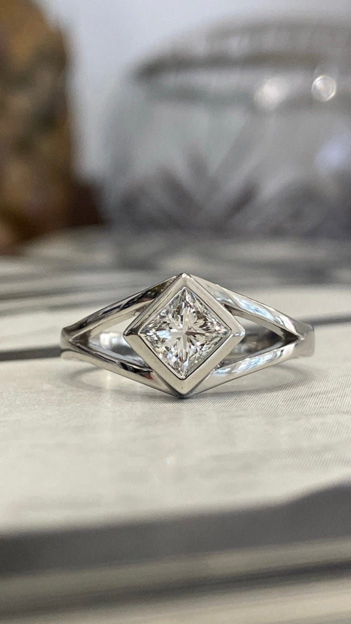 Bespoke "Superwoman" Princess Cut Diamond Bezel Set Engagement Ring Platinum