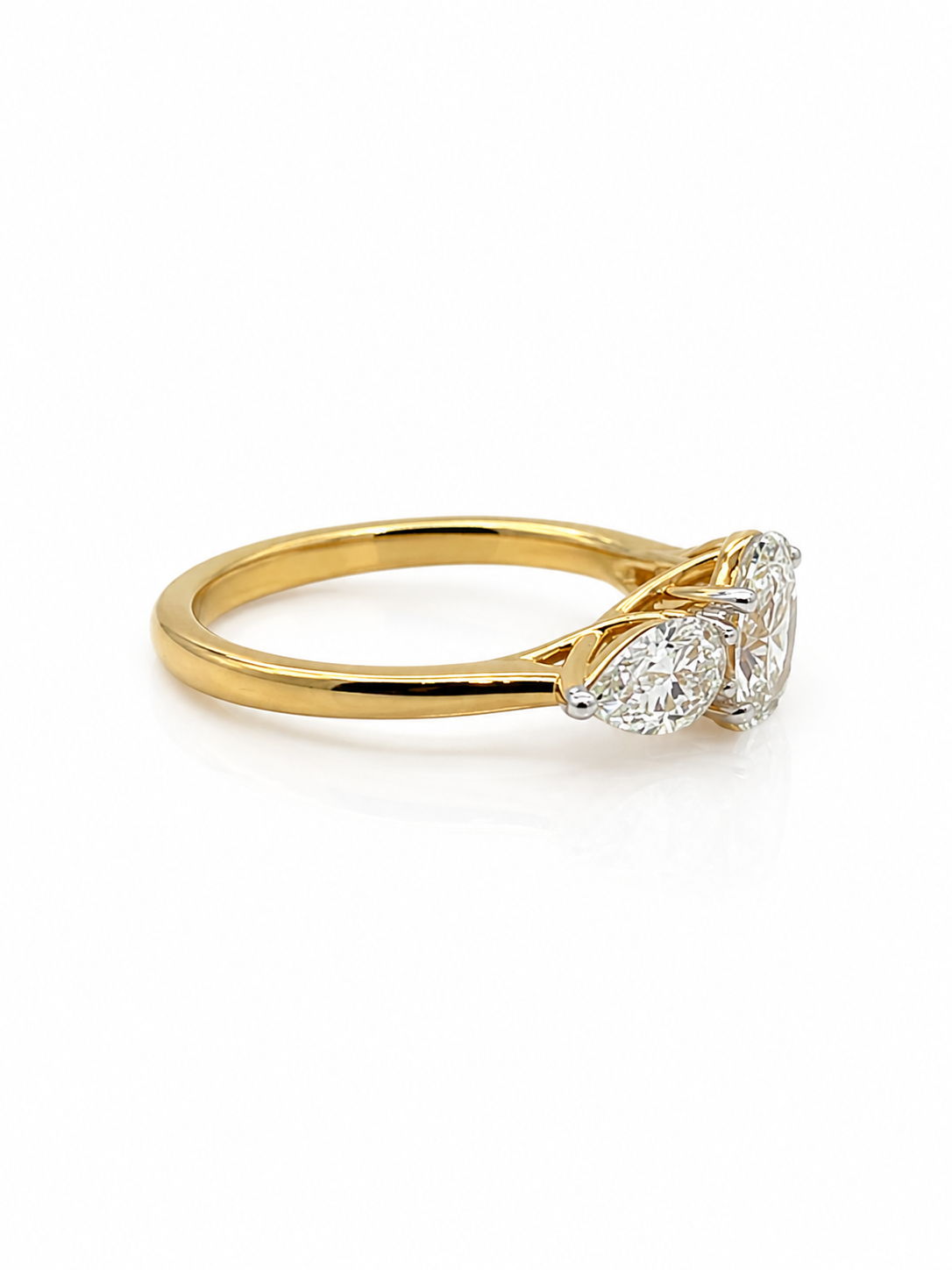 Oval and Pear Diamond Trilogy Ring in Yellow Gold
