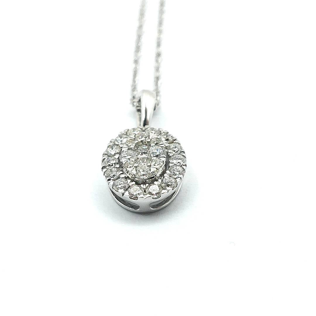 18ct White Gold Diamond Pendant Oval Halo