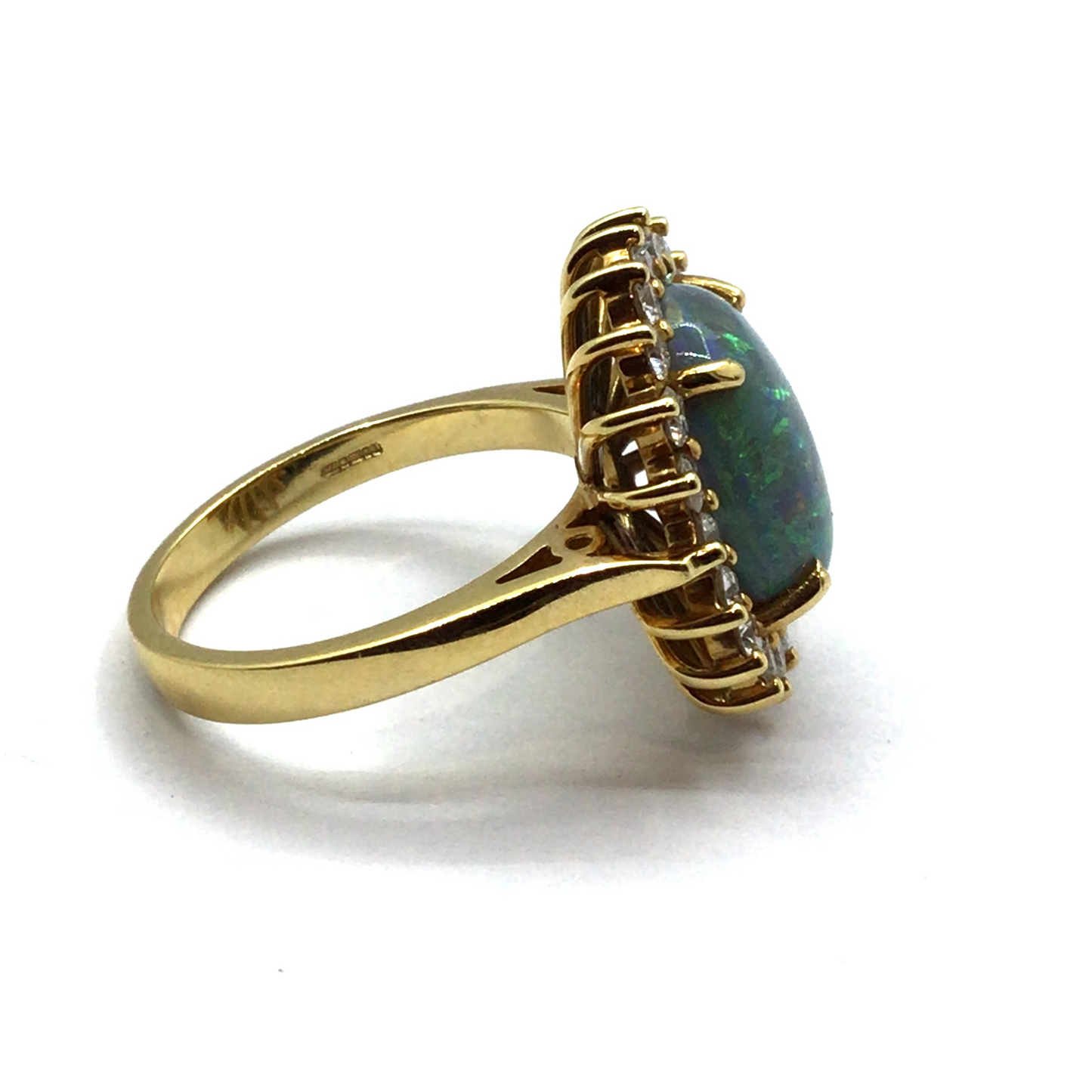 Opal and diamond halo 18ct yellow gold ring