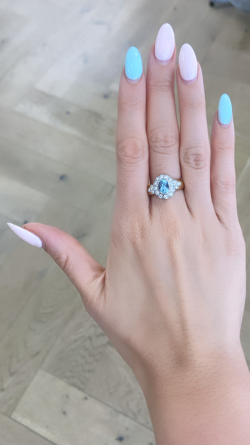 Oval Aquamarine and Diamond Halo Ring With Wide 18ct Gold Band