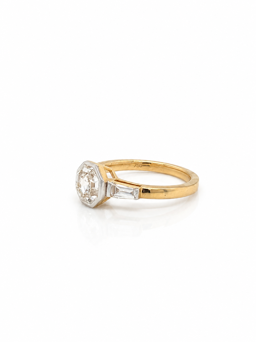 Diamond Trilogy Ring in Yellow Gold with an Octagonal centre