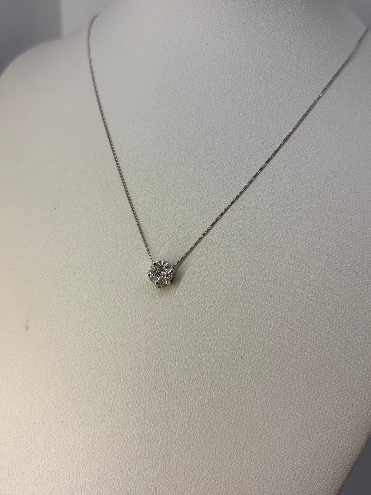 18ct white gold cluster floating pendant with natural round brilliant diamonds- Sold with 9ct white gold chain