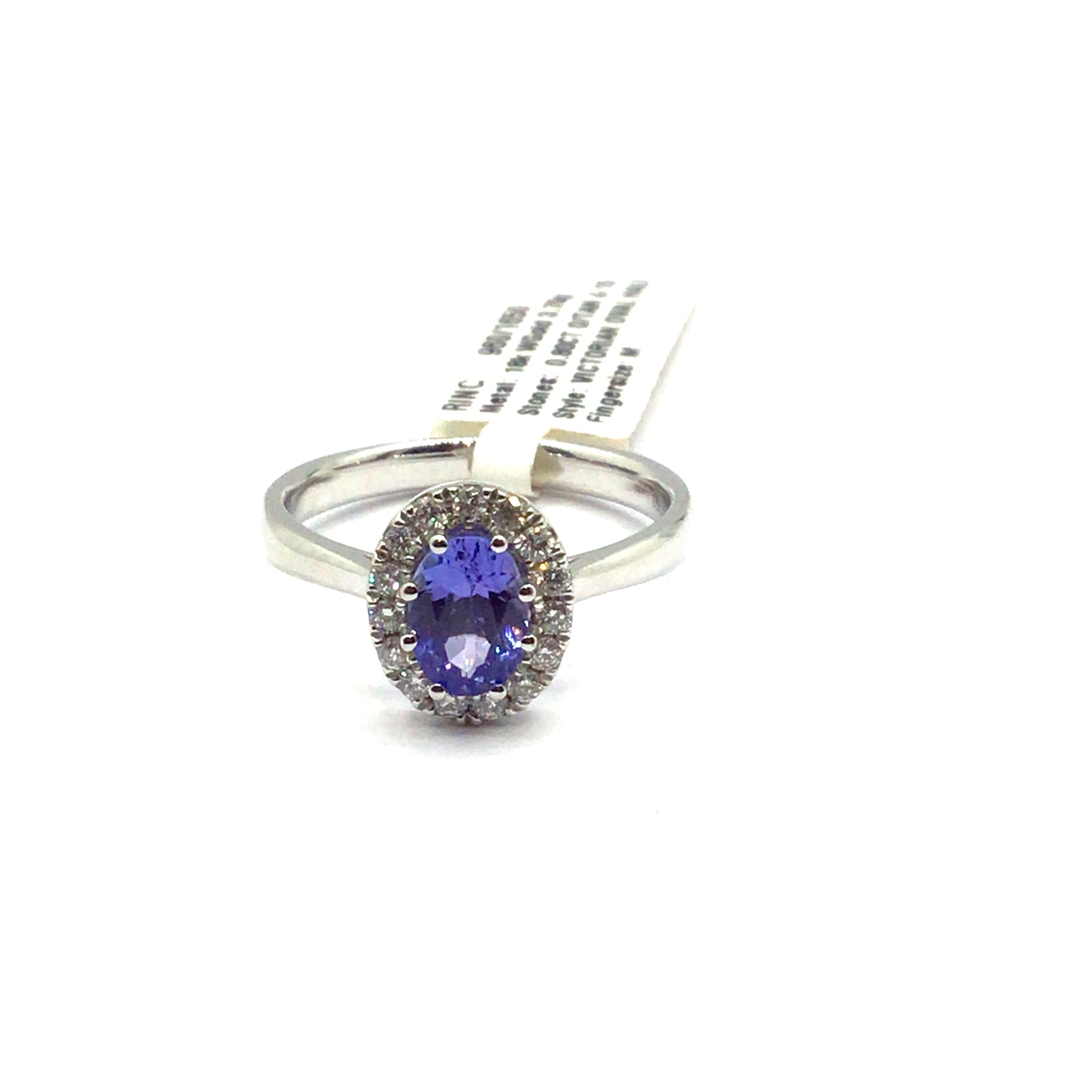 18ct white gold oval tanzanite with diamond halo