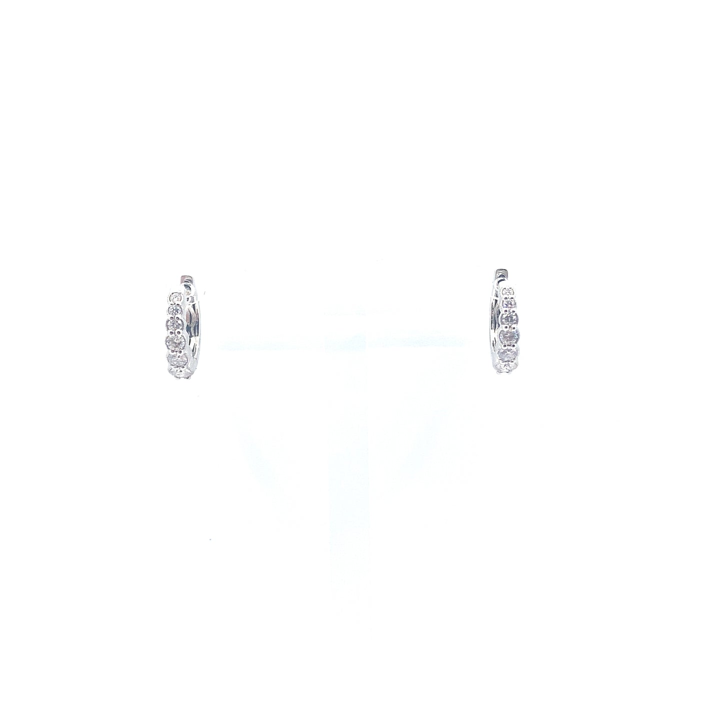 18K WG 12RD 0.52CT HVS GRADUATED HUGGIE