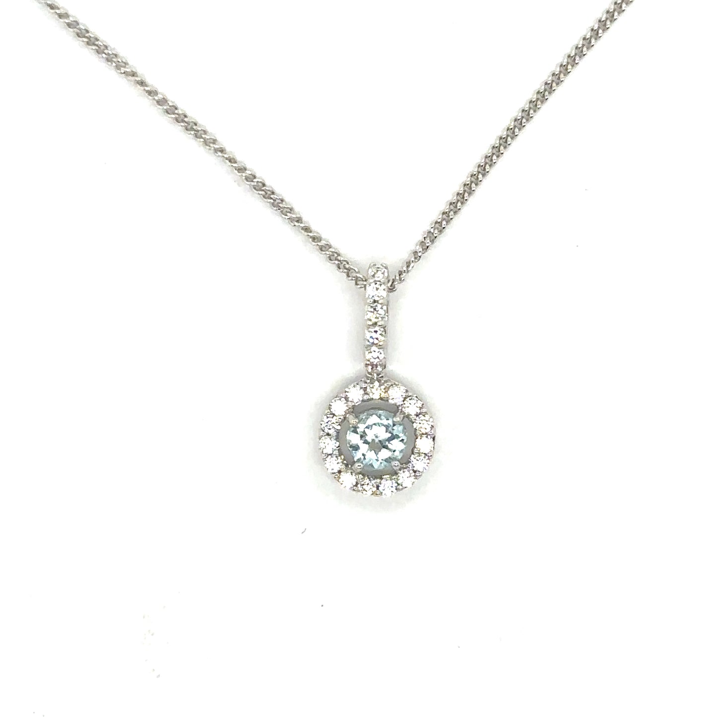 Round Brilliant Cut Sky Blue Topaz with a Cubic Zirconia Halo Set in Sterling Silver Pendant Necklace.