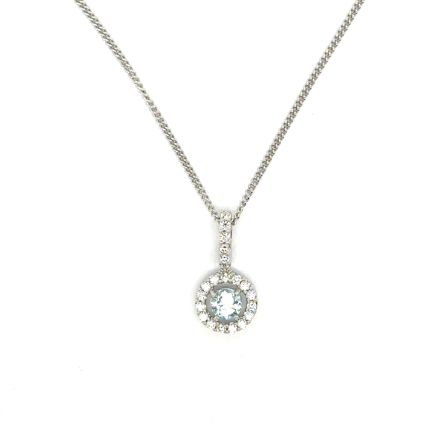 Round Brilliant Cut Sky Blue Topaz with a Cubic Zirconia Halo Set in Sterling Silver Pendant Necklace.