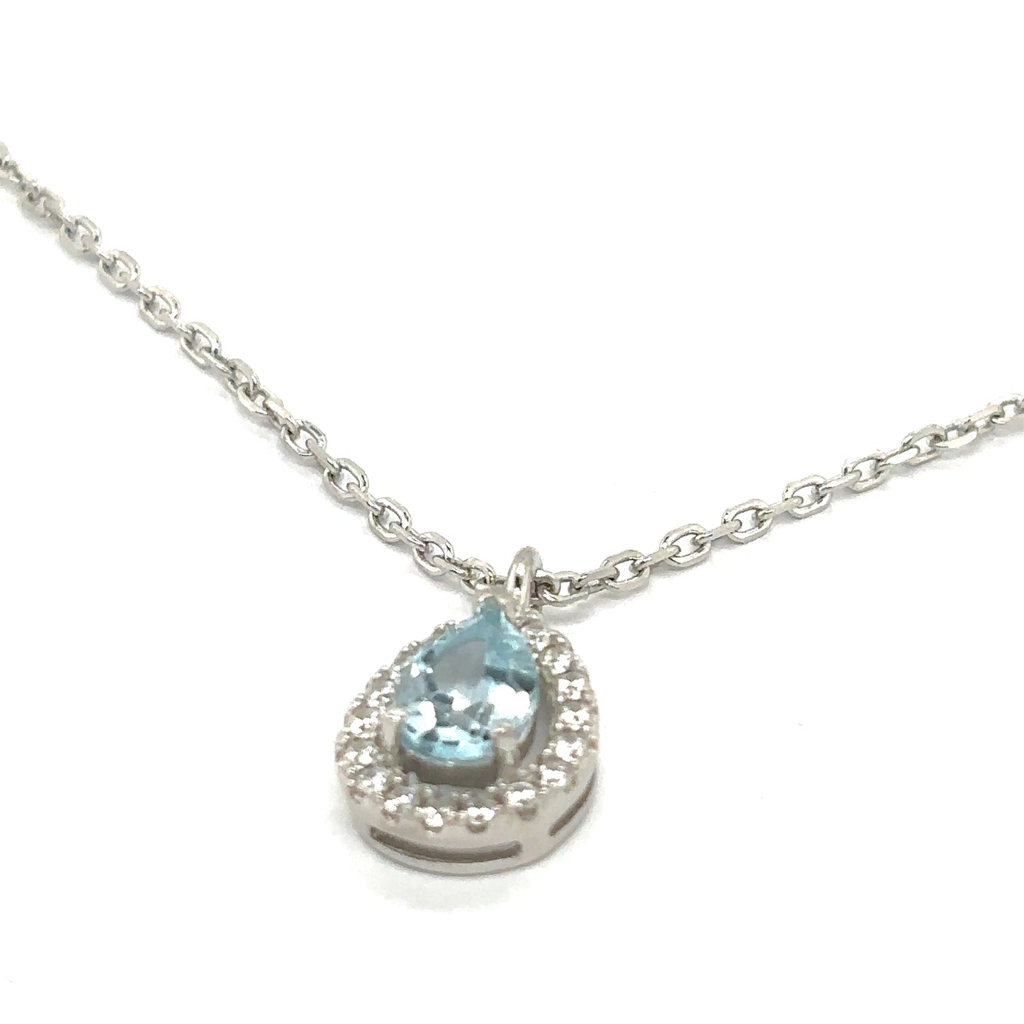 Pear Cut Sky Blue Topaz with a Cubic Zirconia Halo Set in Sterling Silver Pendant Necklace