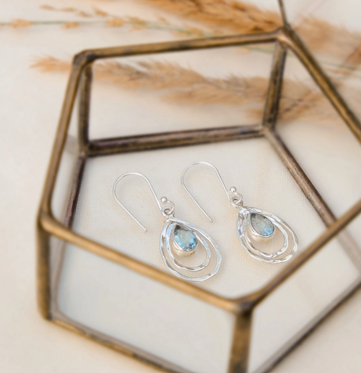 925 Silver Hammered Effect Pear Drop Earrings with Pear Cut Blue Topaz Centre