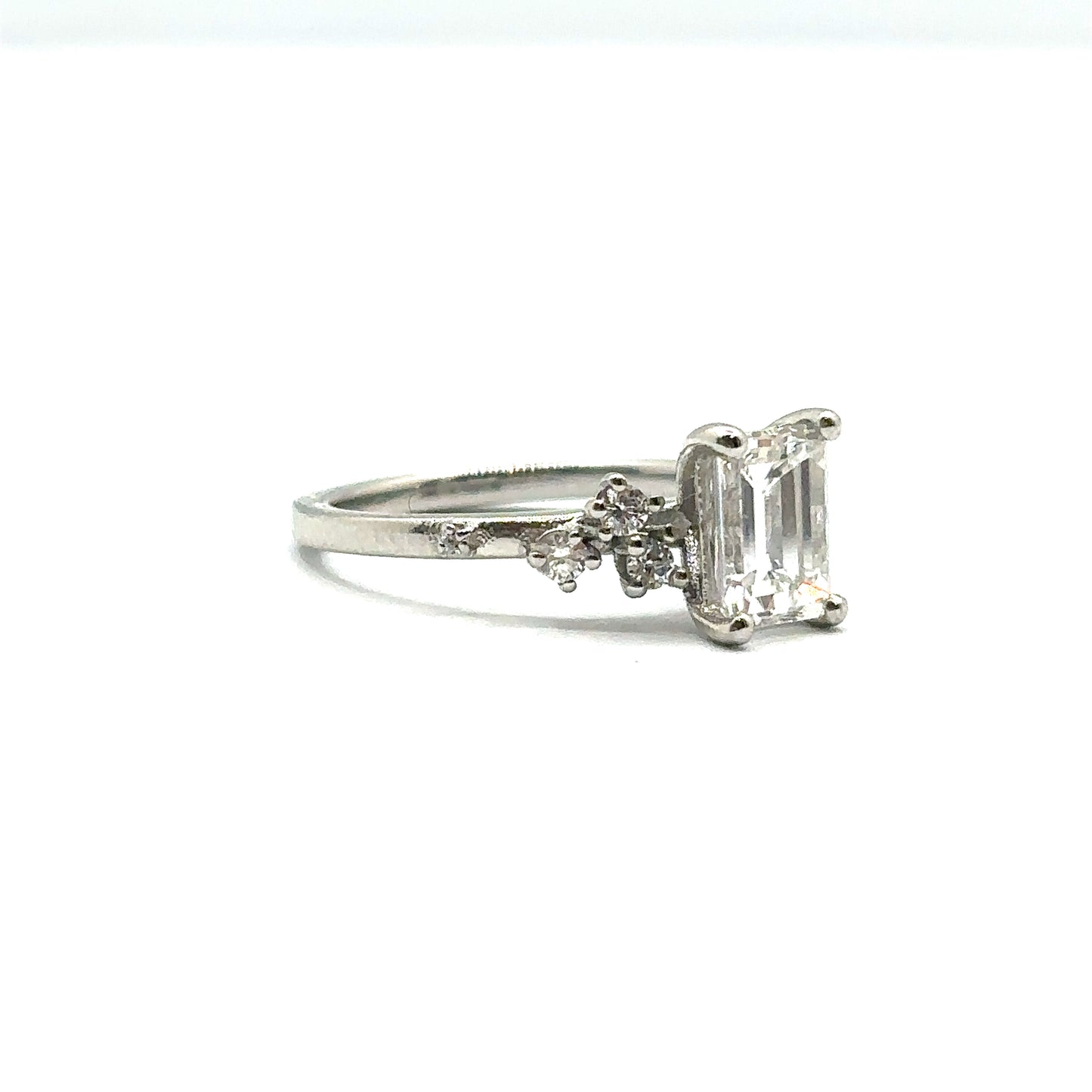 Emerald Cut Diamond and Flowing Nature Diamond Engagement Ring