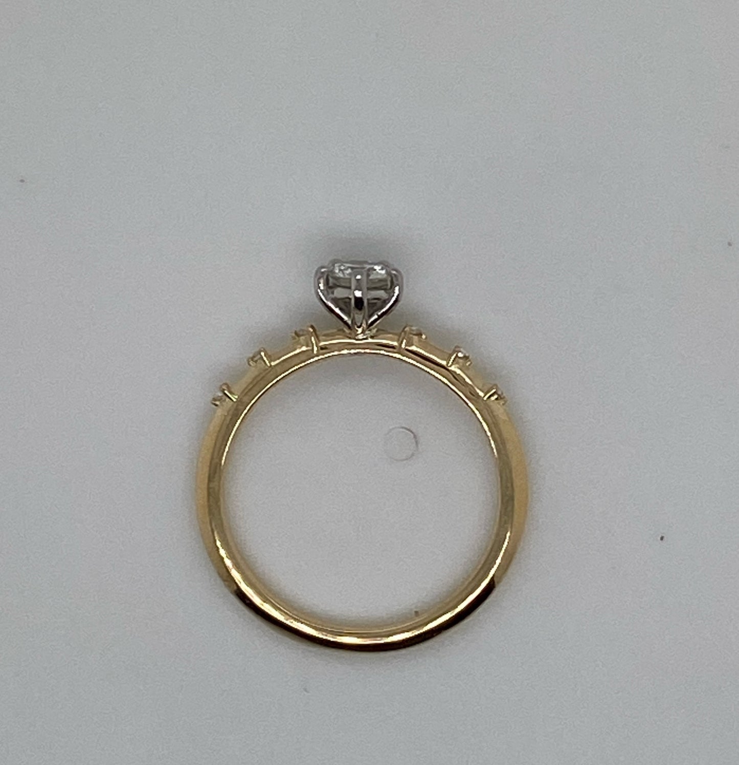 001683 BESPOKE: (using customers stones) 18ct yellow gold shank, stones along the band yellow claws. centre stone 5 cat claws in platinum ring finger size i.5