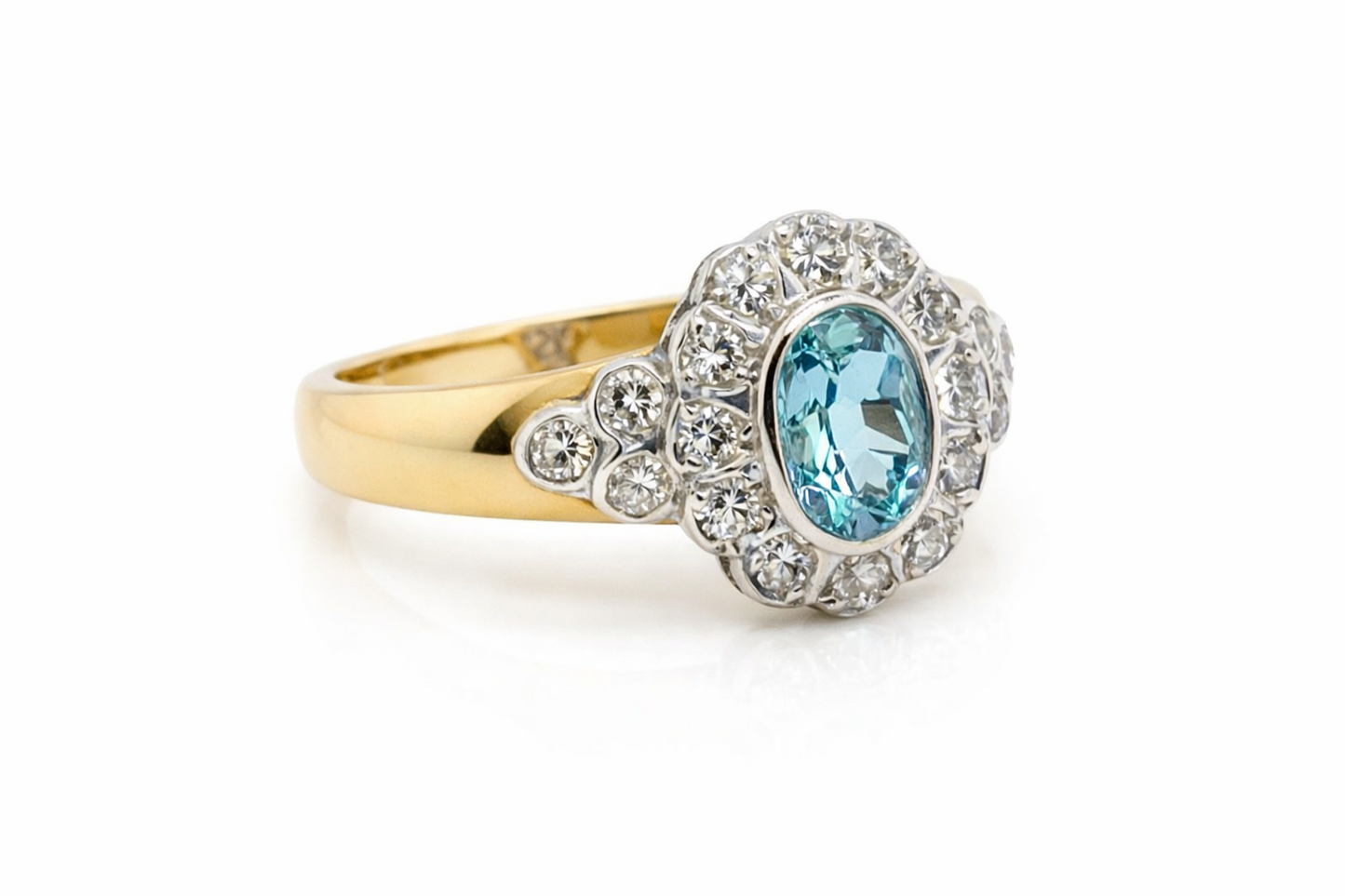 Oval Aquamarine and Diamond Halo Ring With Wide 18ct Gold Band