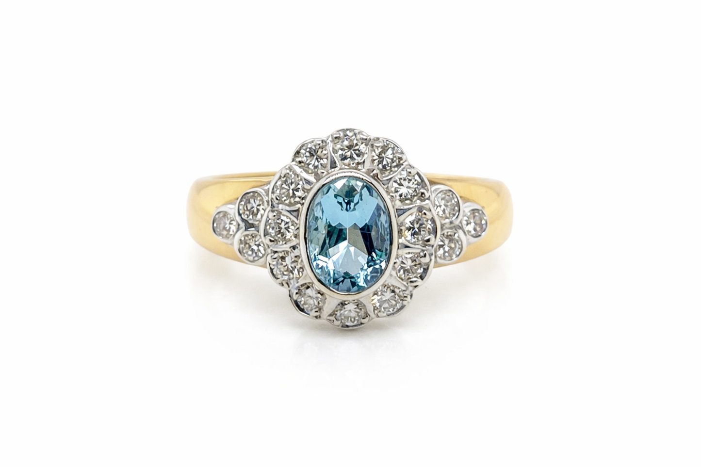 Oval Aquamarine and Diamond Halo Ring With Wide 18ct Gold Band
