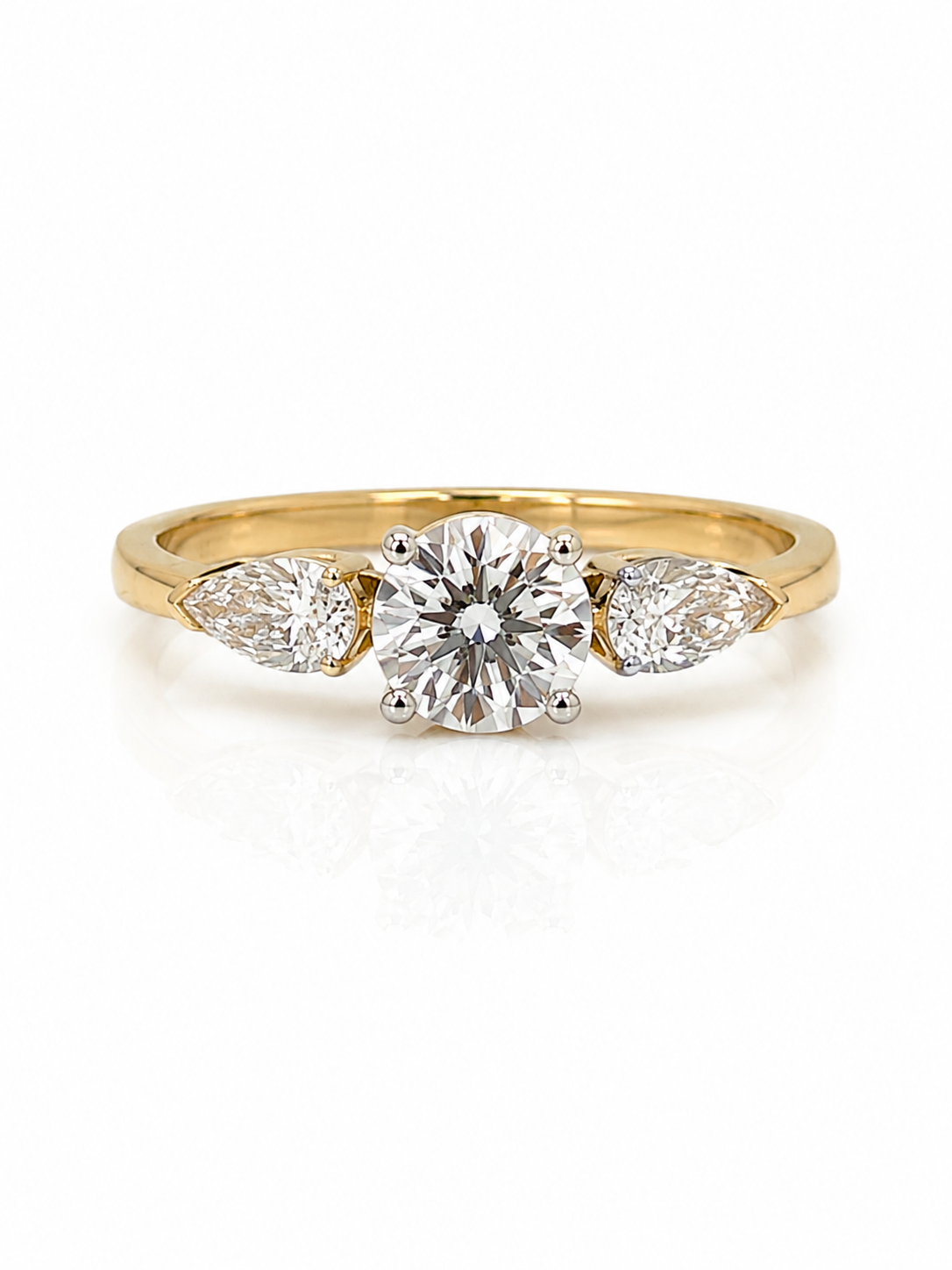Diamond Trilogy Ring in Yellow Gold with a Round Brilliant Cut Centre