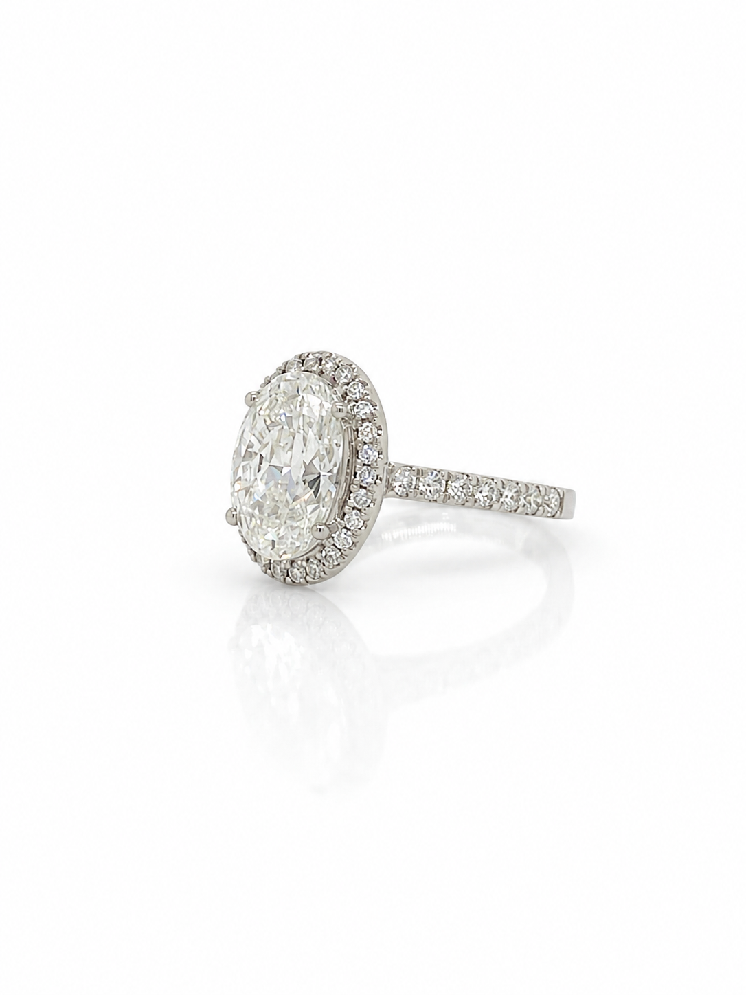 Halo Oval Cut Diamond Ring in Platinum