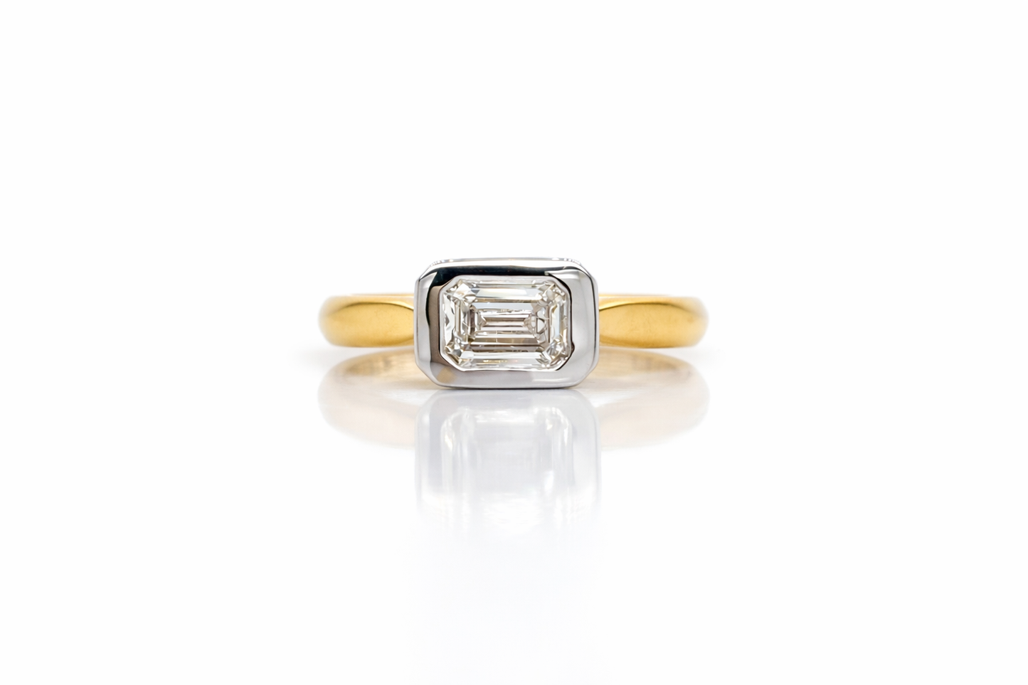 Monroe’s 1.01ct Emerald Cut Lab Grown Diamond Bezel Set Ring in 9ct Yellow Gold
