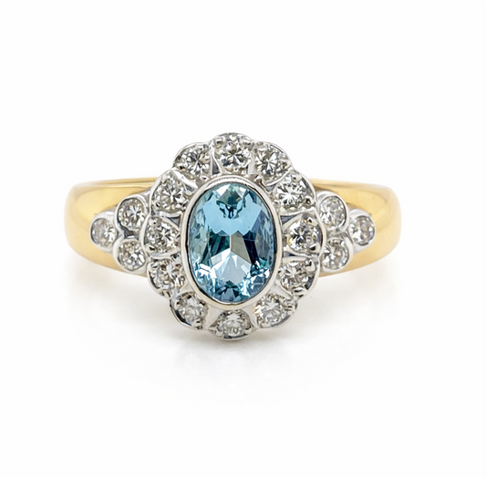 Oval Aquamarine and Diamond Halo Ring With Wide 18ct Gold Band