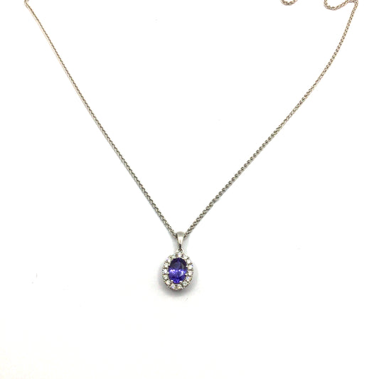 18ct white gold oval tanzanite with diamond halo