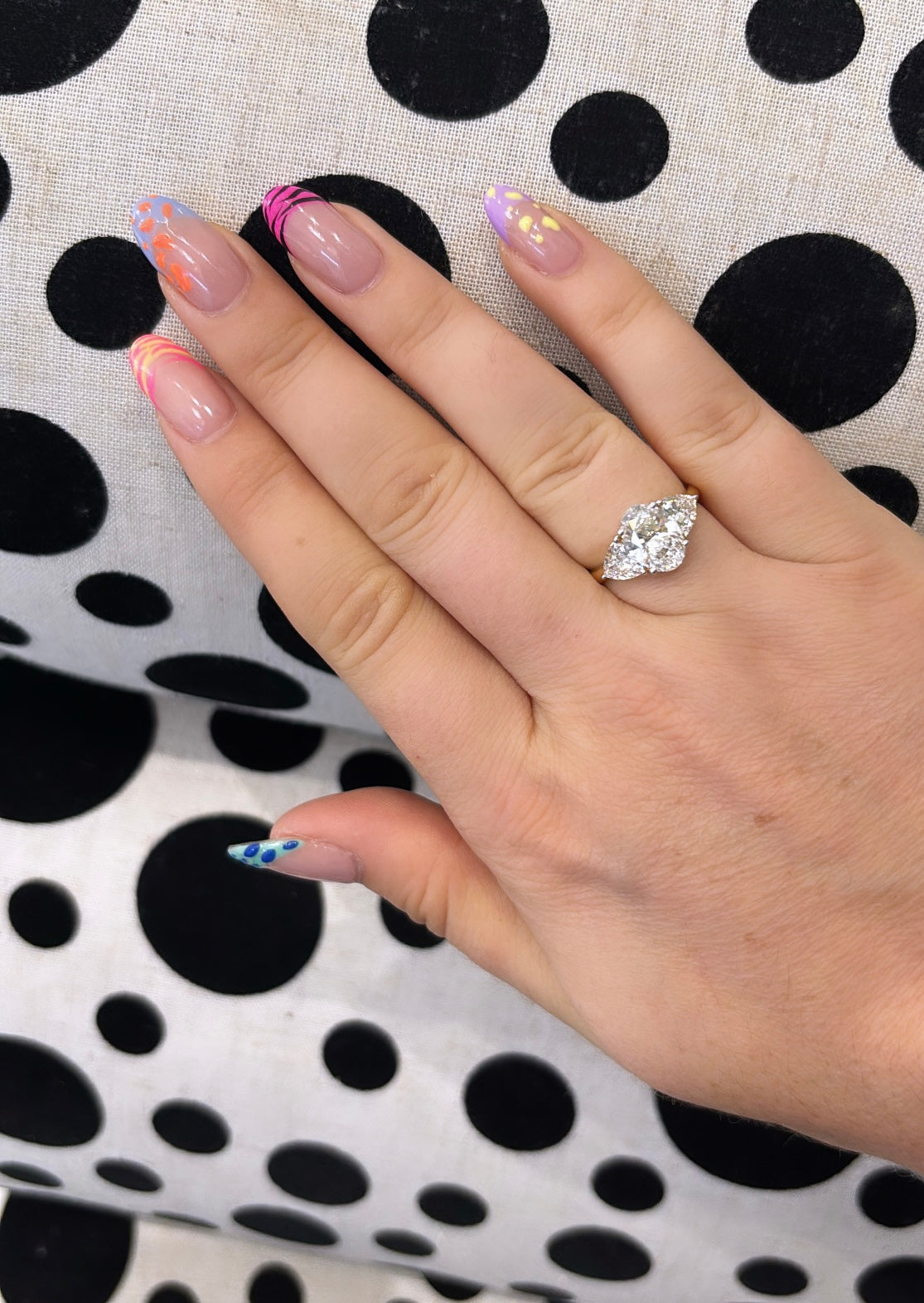 Oval and Trilliant Cut Diamond Trilogy Ring in Yellow Gold