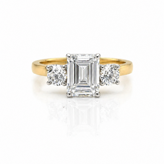 Emerald And Round White Diamond Triology Three Stone Engagement Ring