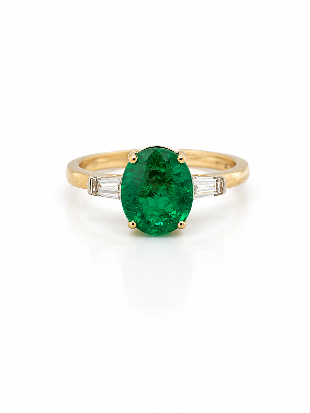 Diamond Trilogy Ring with 3.31cts Oval Cut Emerald in Yellow Gold