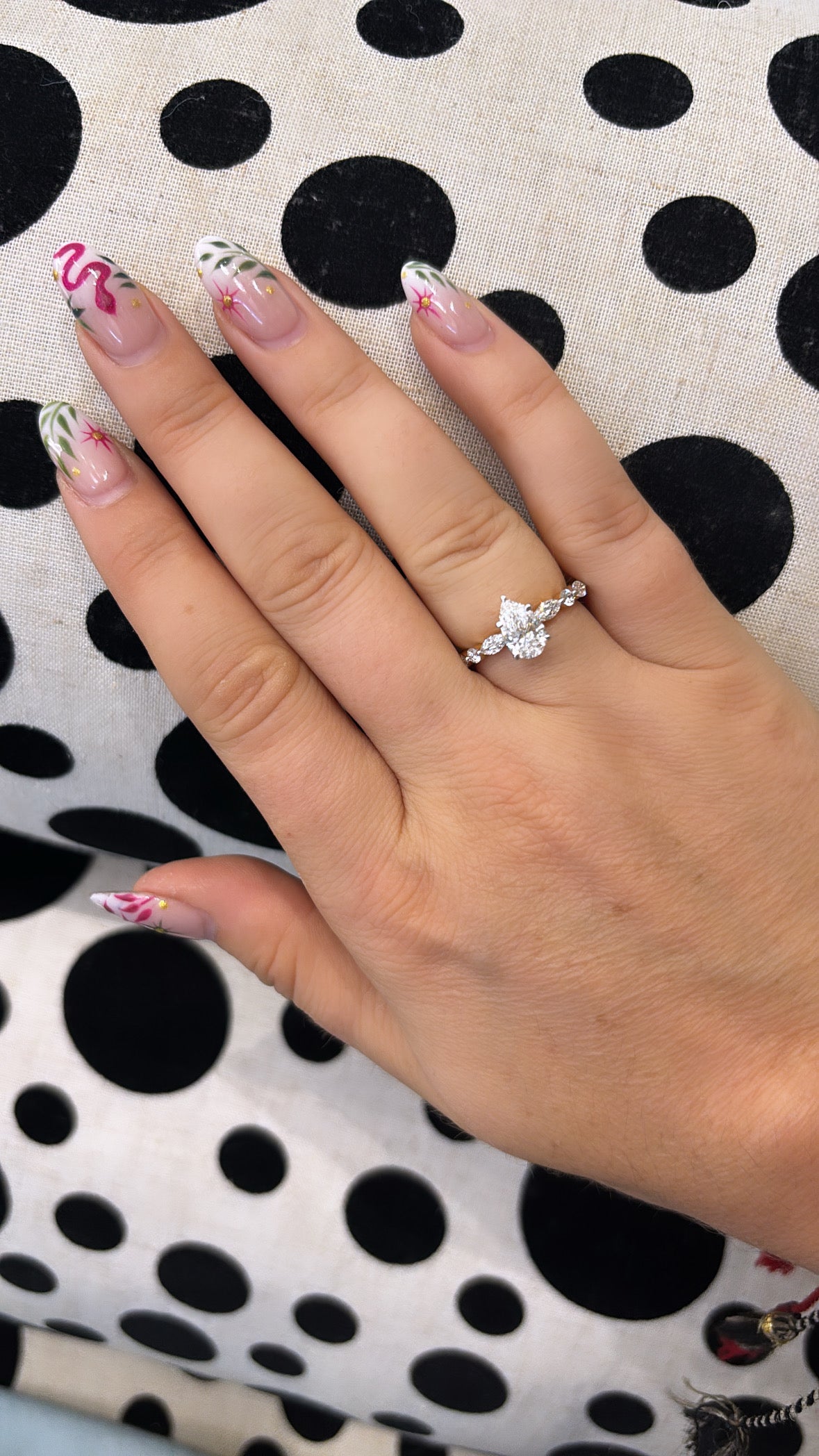 Pear Cut Diamond with Hidden Halo and a Marquise and Round Brilliant Cut Diamond Ring in Yellow Gold