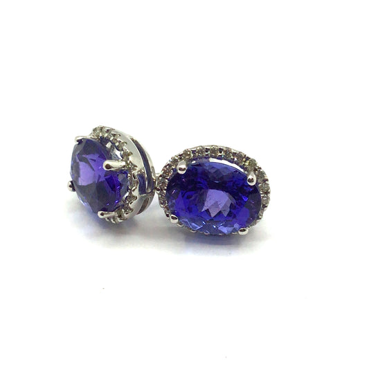 18ct white gold oval tanzanite 5.60ct with diamond halo