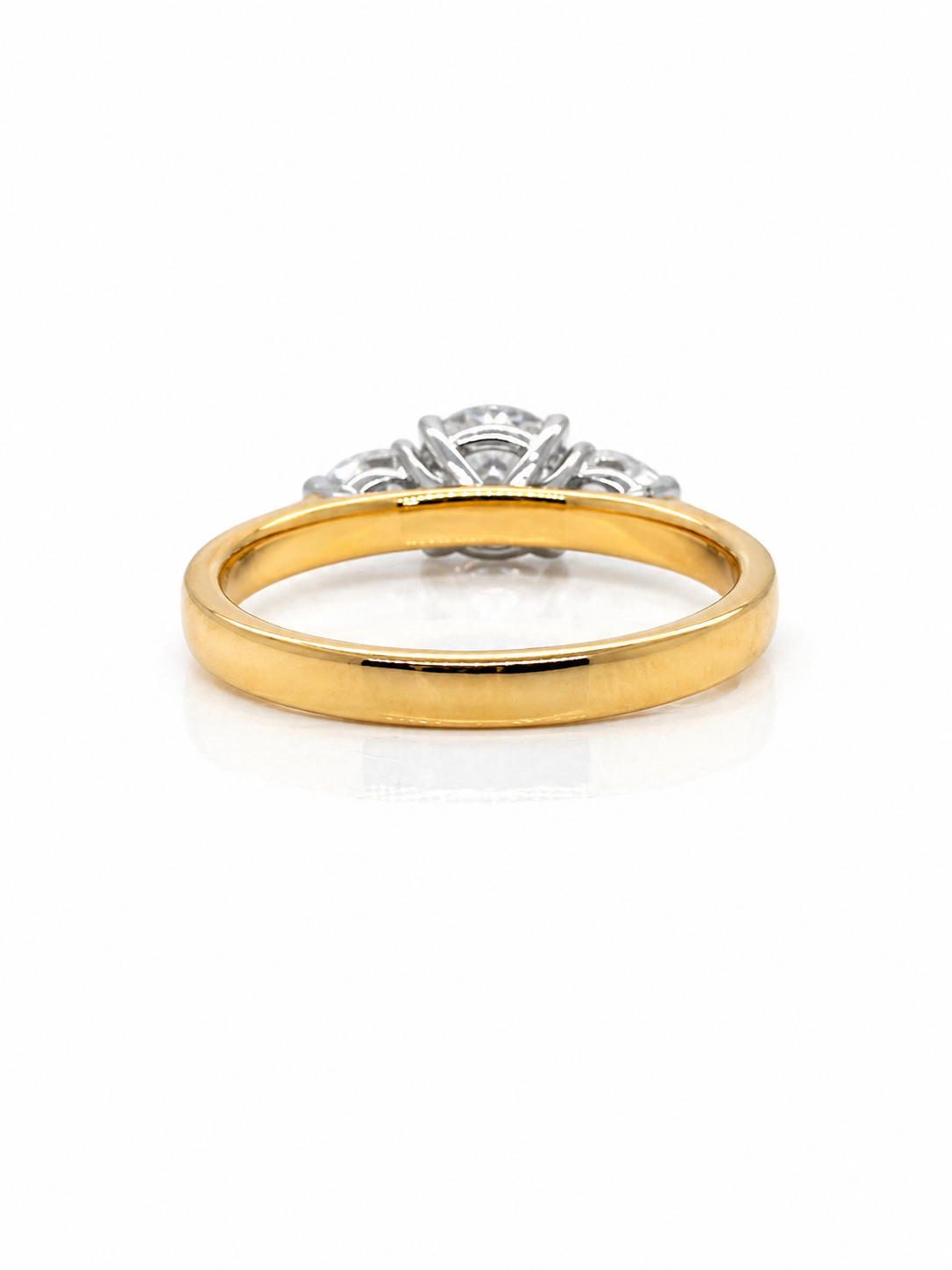 Round White Diamond Trilogy Three Stone Engagement Ring