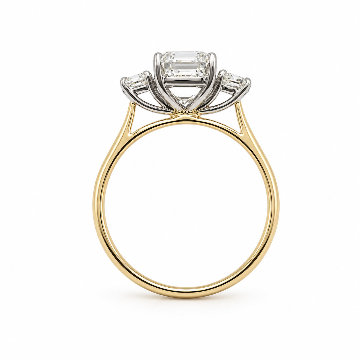 3ct Emerald Cut Diamond and Trapezoid Diamond Trilogy Ring in 18ct Yellow Gold with White Gold Head