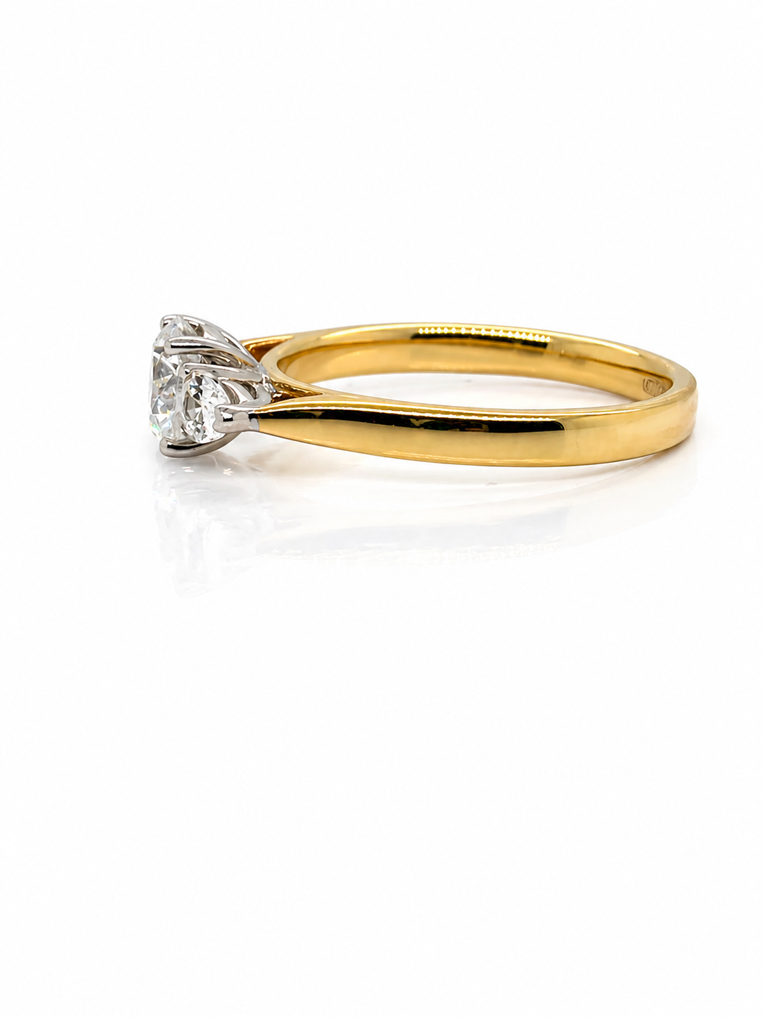 Round White Diamond Trilogy Three Stone Engagement Ring
