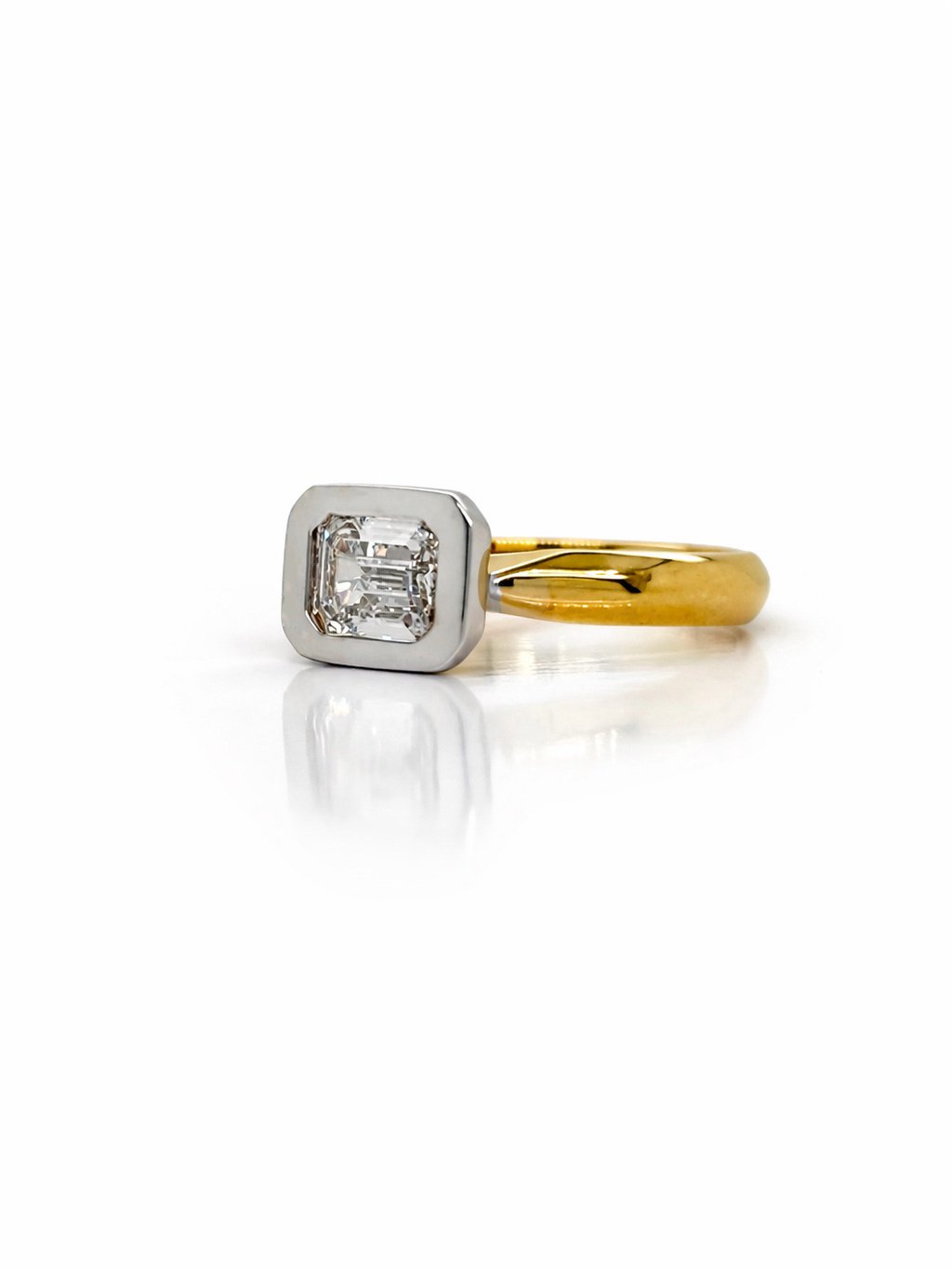 Monroe’s 1.01ct Emerald Cut Lab Grown Diamond Bezel Set Ring in 9ct Yellow Gold