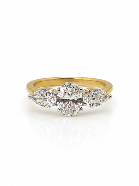 Oval and Pear Diamond Trilogy Ring in Yellow Gold