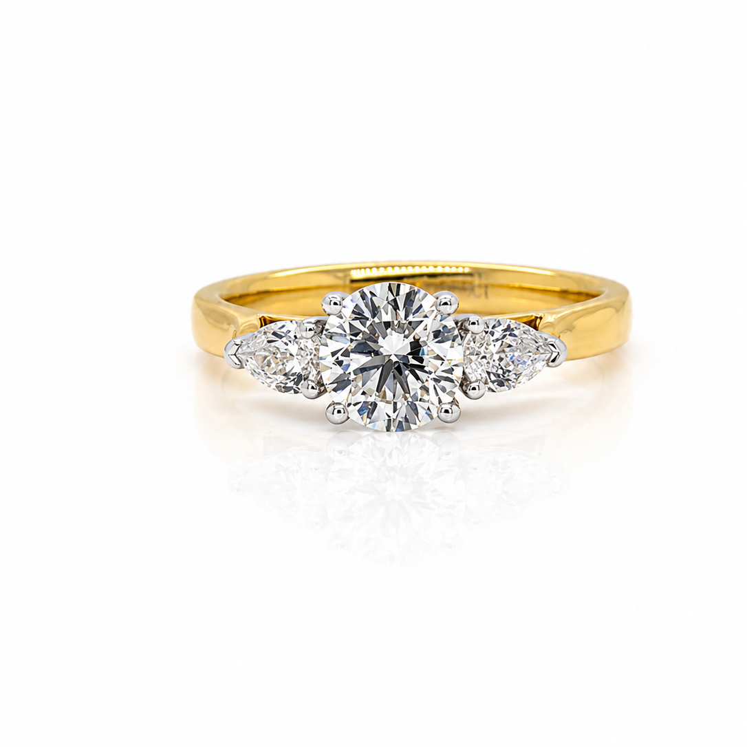 Round White Diamond Trilogy Three Stone Engagement Ring