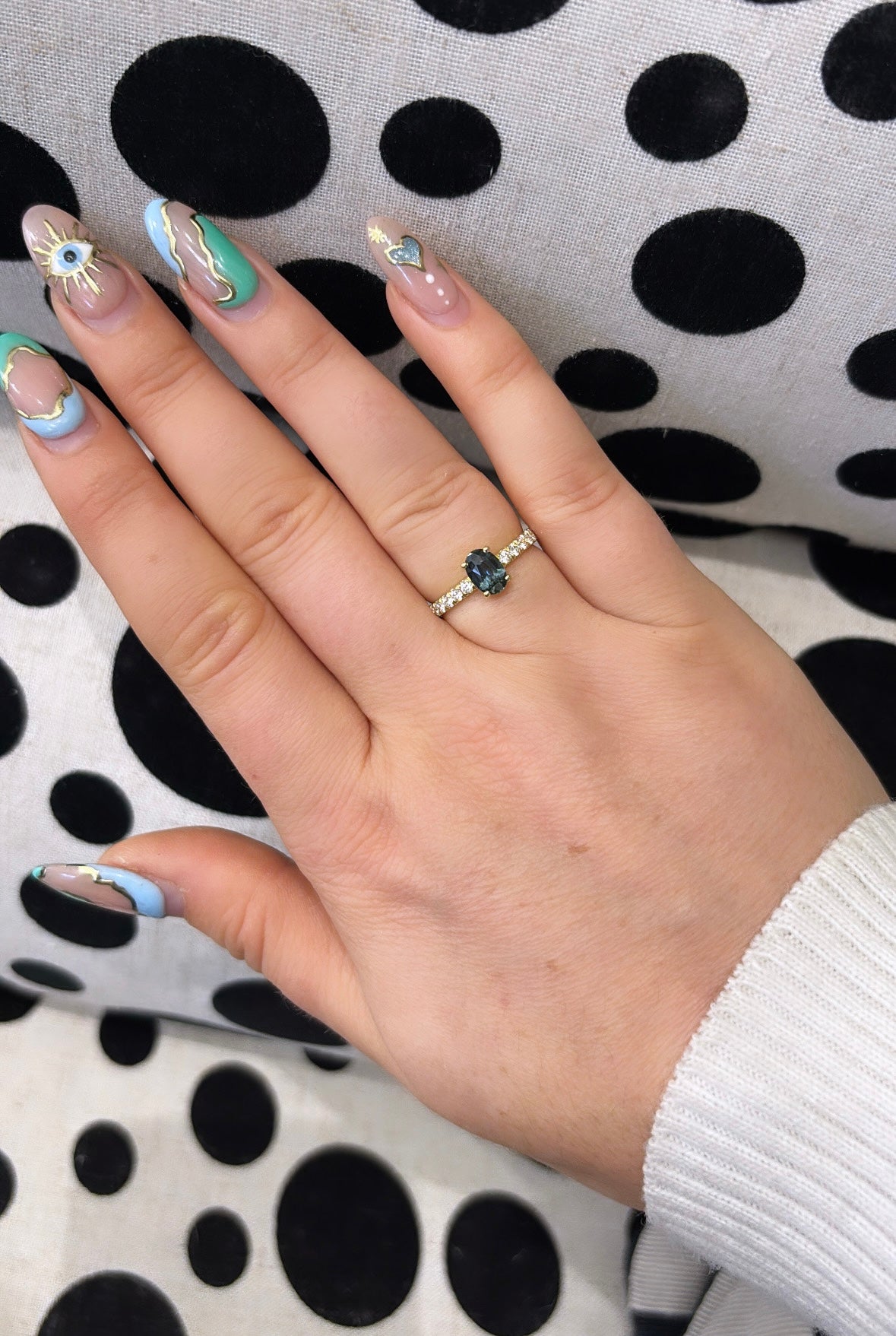 Oval Cut Green-Blue Sapphire with a Diamond Set Band, in 18ct Yellow Gold