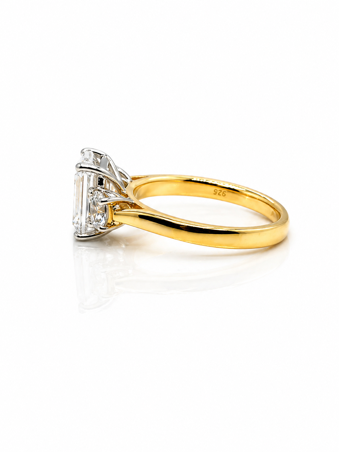 Emerald And Round White Diamond Triology Three Stone Engagement Ring