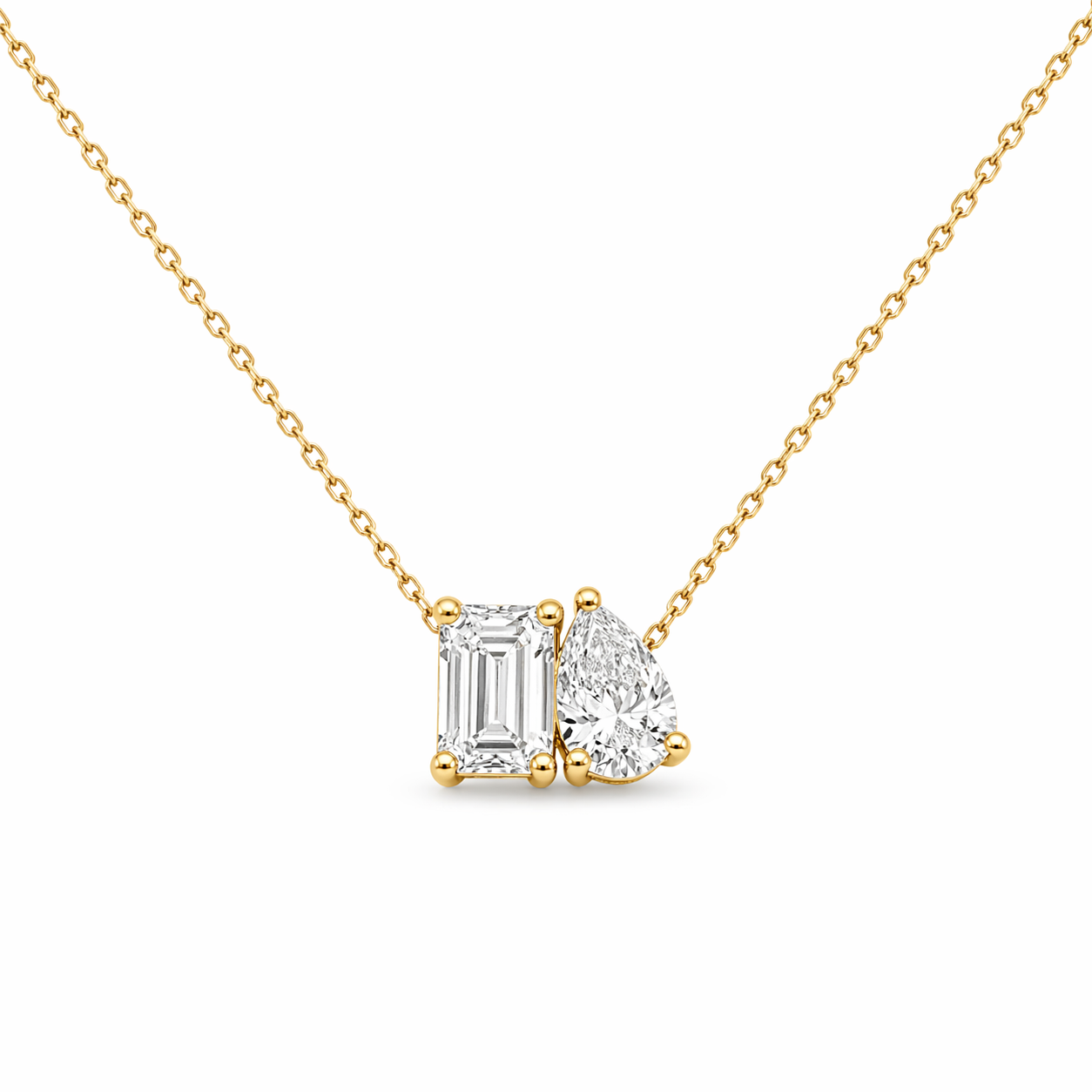 18ct yellow gold pear/emerald cut necklace