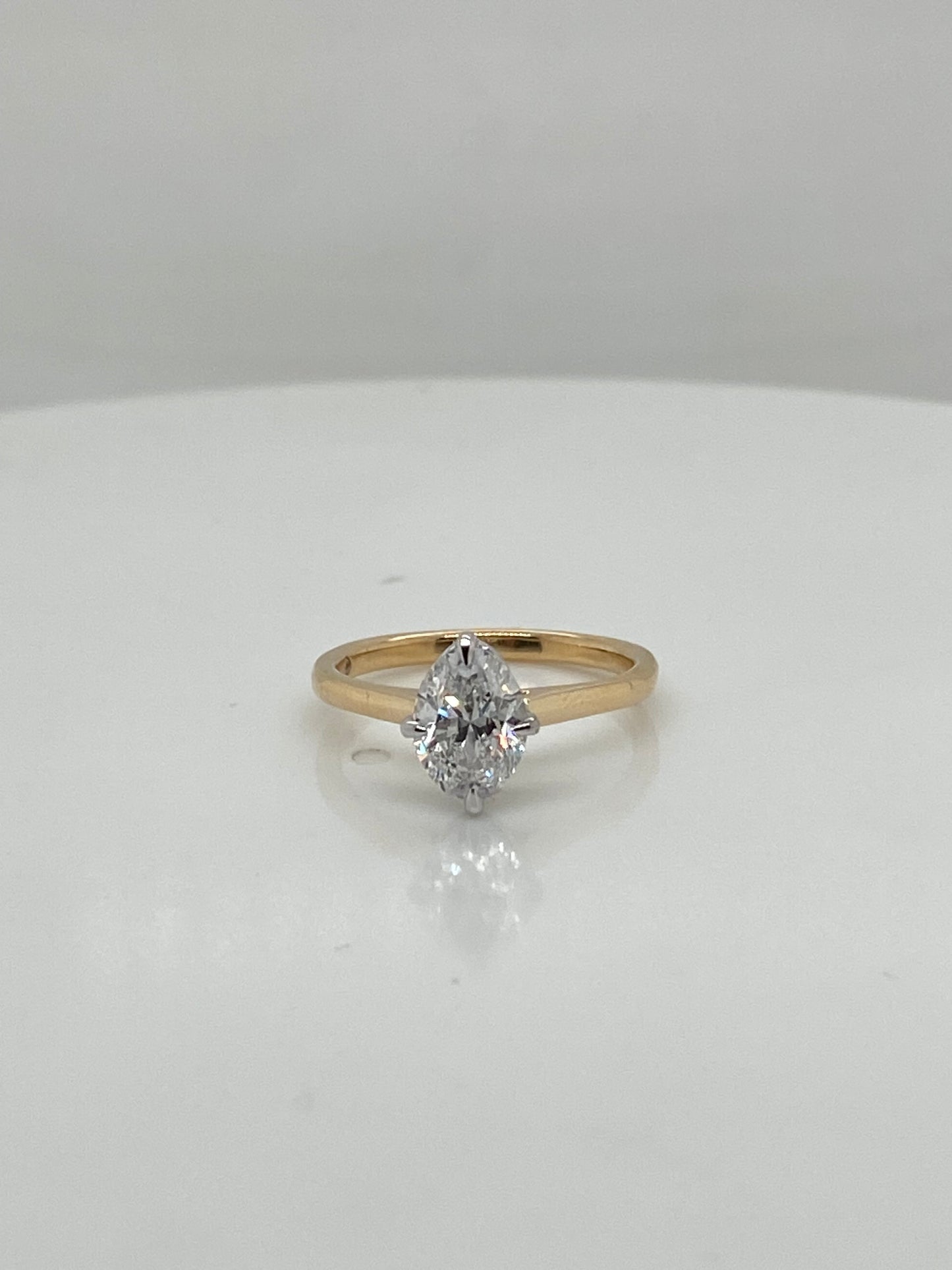 001660- 18ct yellow band with white head, finger size J, with dia halo, oval cut centre 7.5x5mm,, compass claws- add new white head with compass claw setting, but keep yellow band