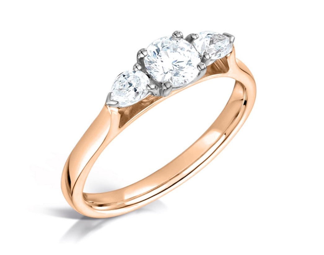 Round Brilliant Cut and Pear Cut Side Stones White Diamond Trilogy Three Stone Engagement Ring - Sample only - Please enquire for prices