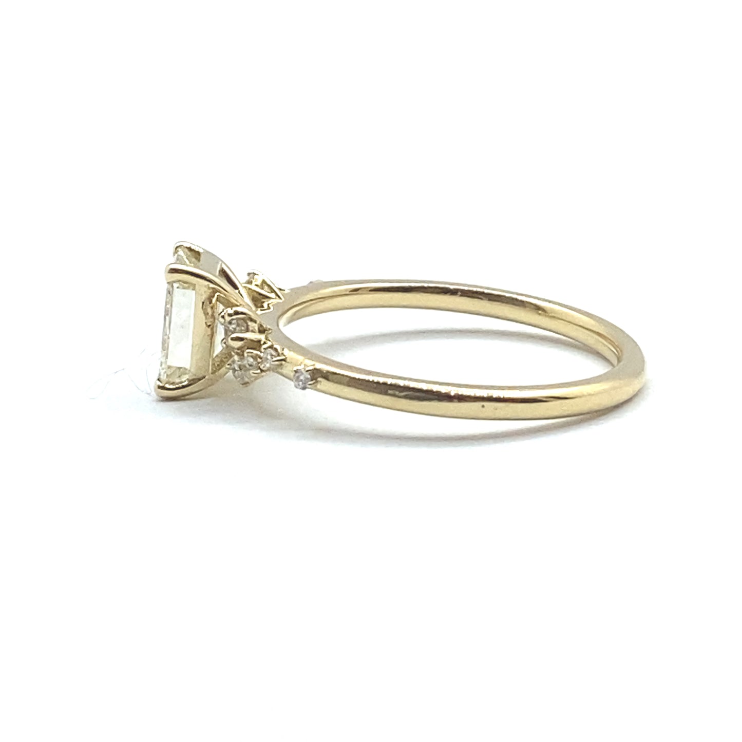 Bespoke Emerald Cut Diamond and Flowing Nature Diamond Engagement Ring