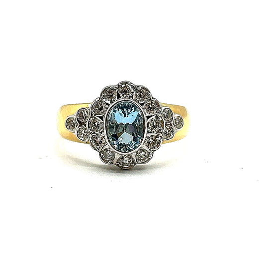 Oval Aquamarine and Diamond Halo Ring With Wide 18ct Gold Band